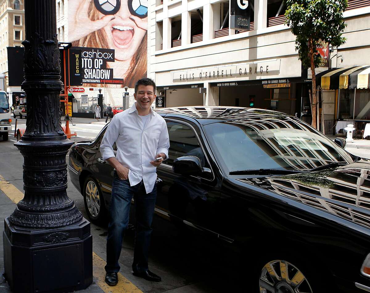 CEO of Uber Travis Kalanick with one of the car Uber service uses to drive customers in San Francisco, Calif. on May 1, 2012.