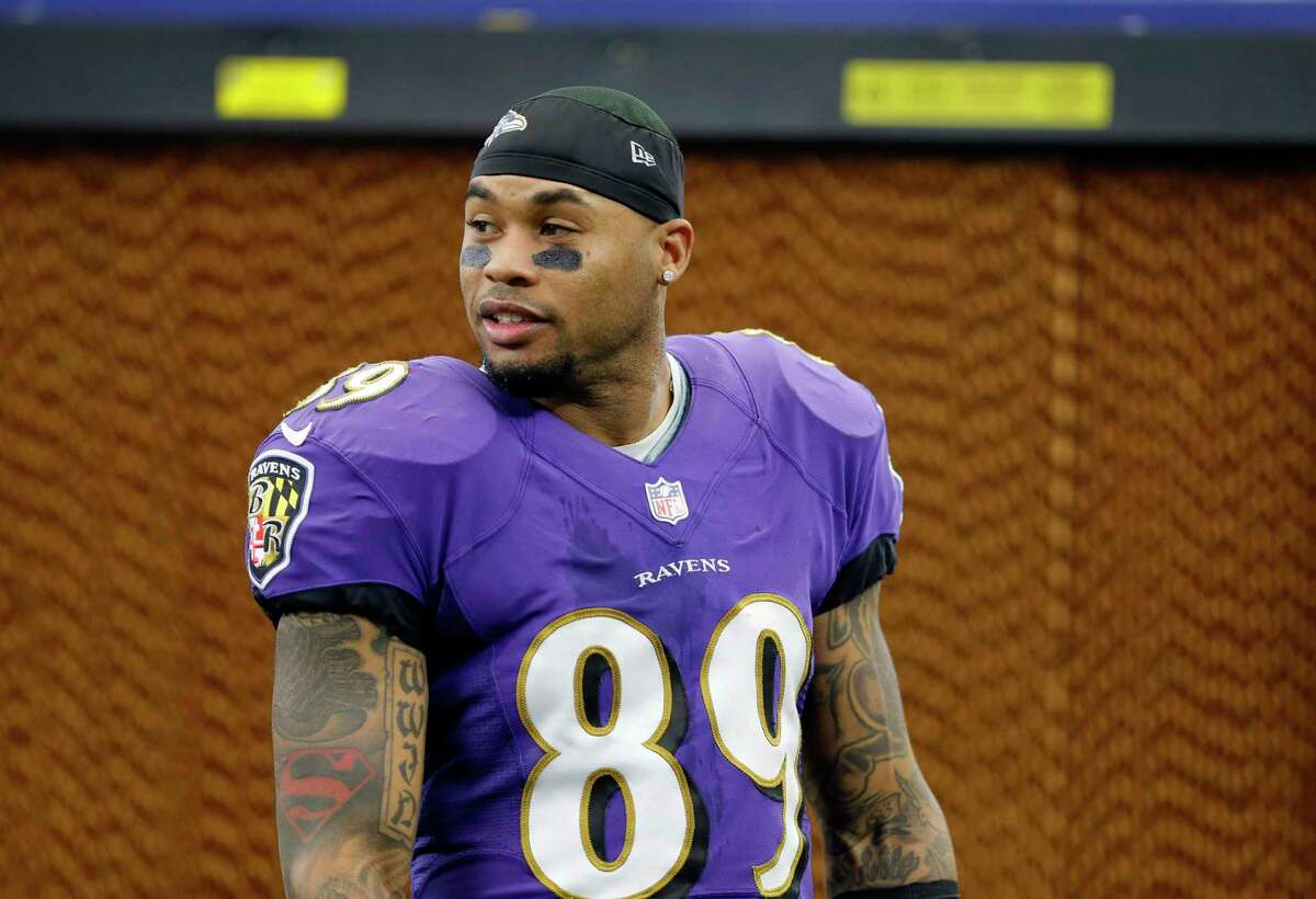 FILE - In this Sunday, Nov. 20, 2016, file photo, Baltimore Ravens wide receiver Steve Smith walks along the sideline during an NFL football game against the Dallas Cowboys, in Arlington, Texas. Life after football hits some NFL players harder than others. Michael Vick, Steve Smith and Justin Forsett are adjusting to their post-NFL careers nicely.(AP Photo/Roger Steinman)