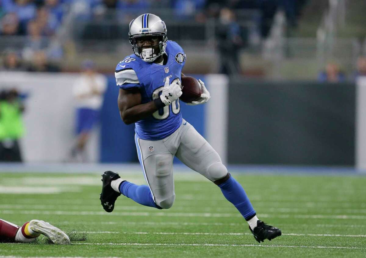FILE - In this Oct. 23, 2016, file photo, Detroit Lions running back Justin Forsett rushes during the first half of an NFL football game against the Washington Redskins, in Detroit. Life after football hits some NFL players harder than others. Michael Vick, Steve Smith and Justin Forsett are adjusting to their post-NFL careers nicely .(AP Photo/Duane Burleson, File)