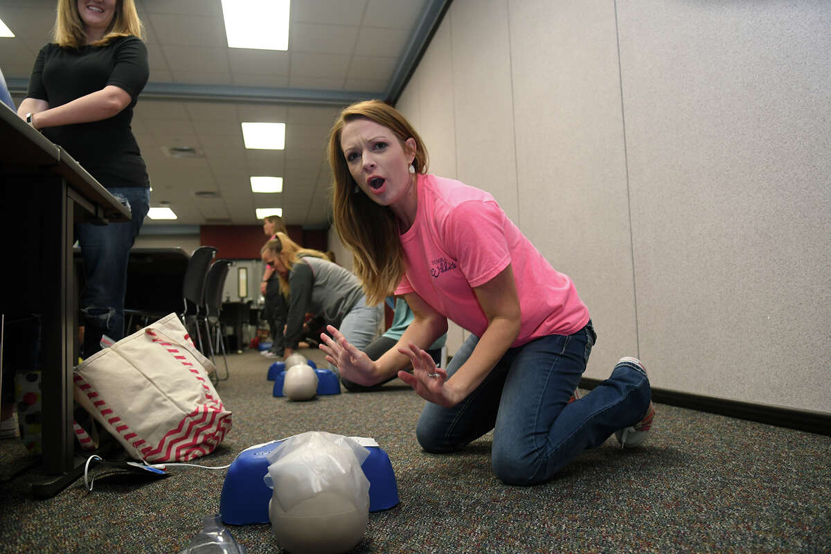 Laura Keene, a stay-at-home mom and former teacher at Canyon Pointe Elem., "shouts for help" during her CPR/AED and First Aid Certification class at the Tomball ISD Staff Development Center in Tomball on June 20, 2017. (Photo by Jerry Baker/Freelance)