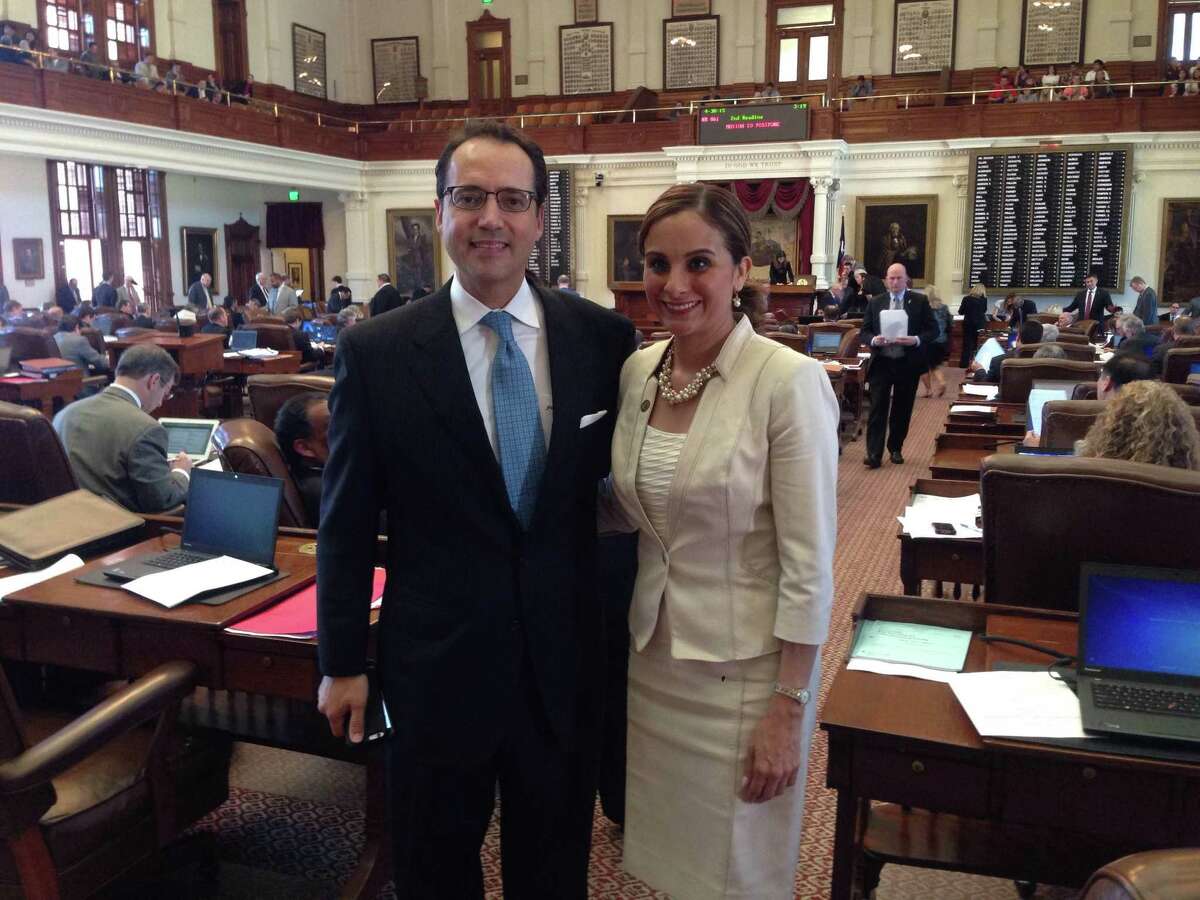 Ina Minjarez, right, stands with state Sen. Jose Menendez on the House floor after her swearing in ceremony in Austin. She became the House representative for District 124 and the newest member of the San Antonio legislative delegation.