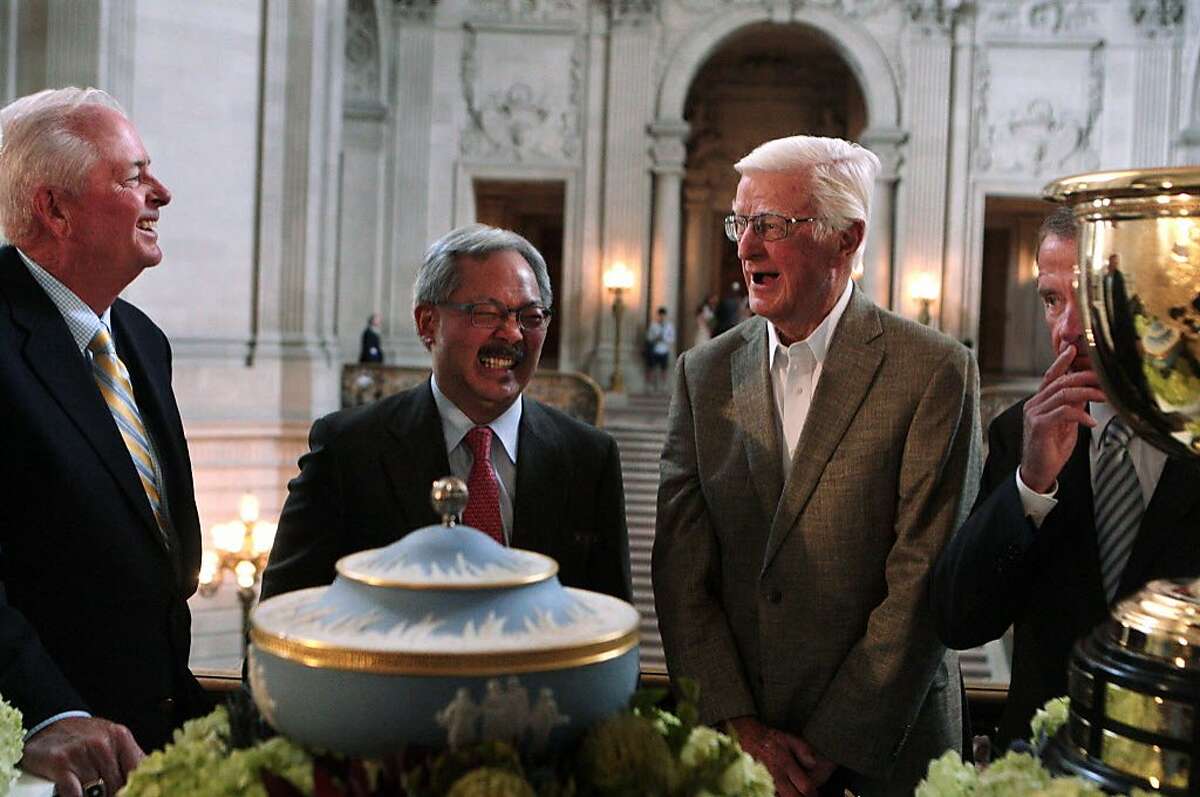 PGA of America President Ted Bishop, left, San Francisco Mayor Ed Lee, second from left, former United States Golf Association President Sandy Tatum, second from right, and PGA Tour Commissioner Tim Finchem, right, share a laugh on Wednesday, July 2, 2014.