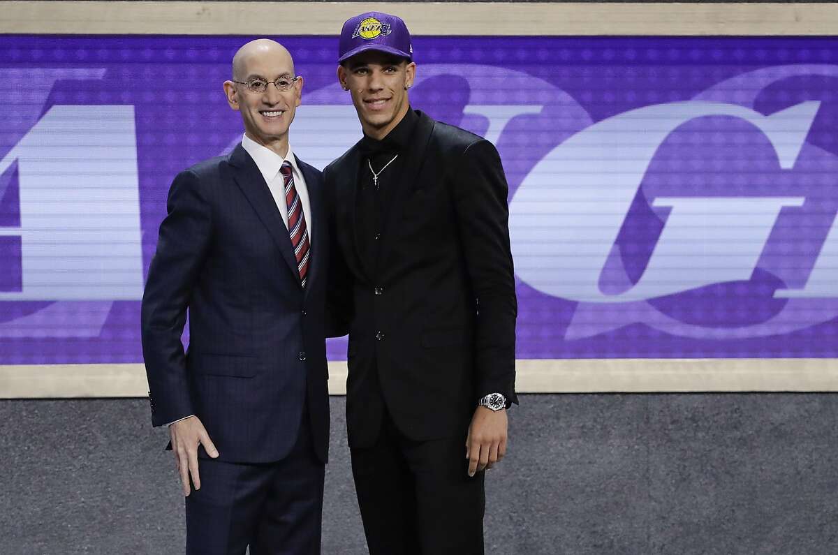Lonzo Ball, right, poses for a photo with NBA Commissioner Adam Silver after being selected by the Los Angeles Lakers as the No. 2 overall pick during the NBA basketball draft, Thursday, June 22, 2017, in New York. (AP Photo/Frank Franklin II)