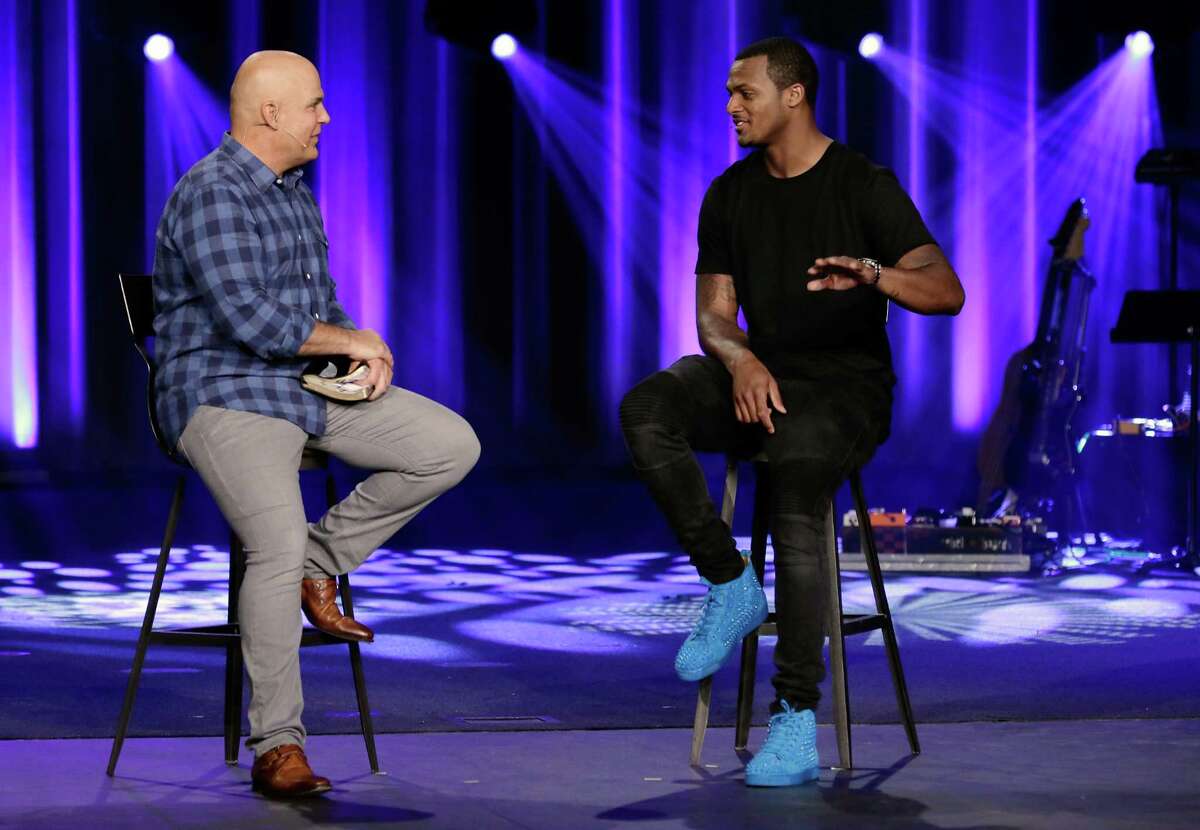 Pastor Kerry Shook interviews Houston Texans new quarterback DeShaun Watson during the 9:30am Sunday morning services at Woodlands Church in The Woodlands, TX, June 17, 2017. (Michael Wyke / For the Chronicle)