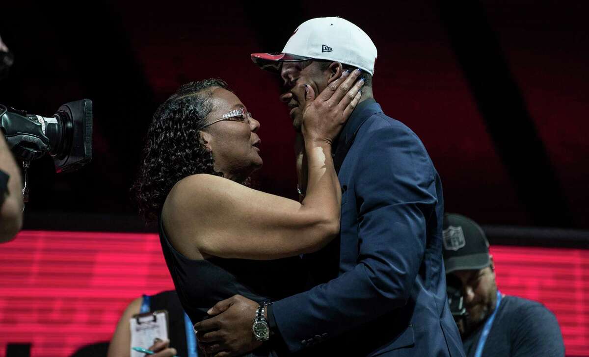 Deann Watson congratulates her son, Deshaun Watson, after the Clemson quarterback was selected by the Texans in the NFL draft in April.