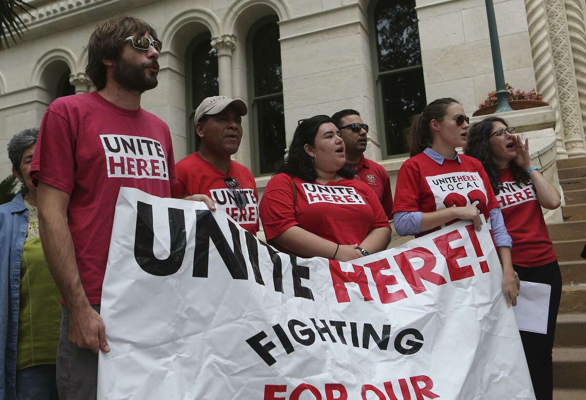 Supporters of Unite Here! chant Thursday June 1, 2017 during an announcement made in front of city hall regarding a lawsuit over Senate Bill 4. Senate Bill 4 allows police officers to question a person?’s immigration status during a detainment.