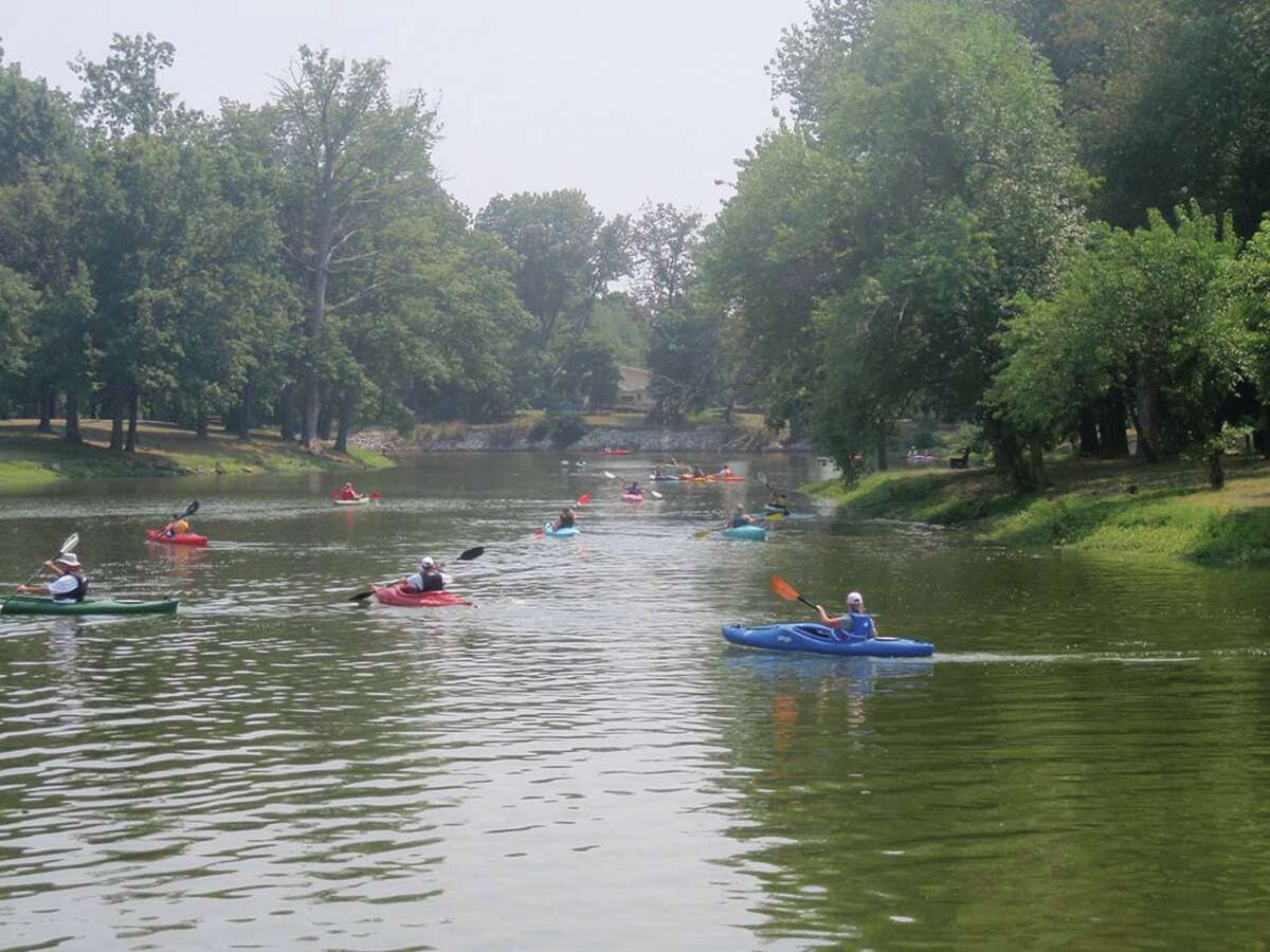 The lake at Drost Park is crowded with participants during a previous kayak day.