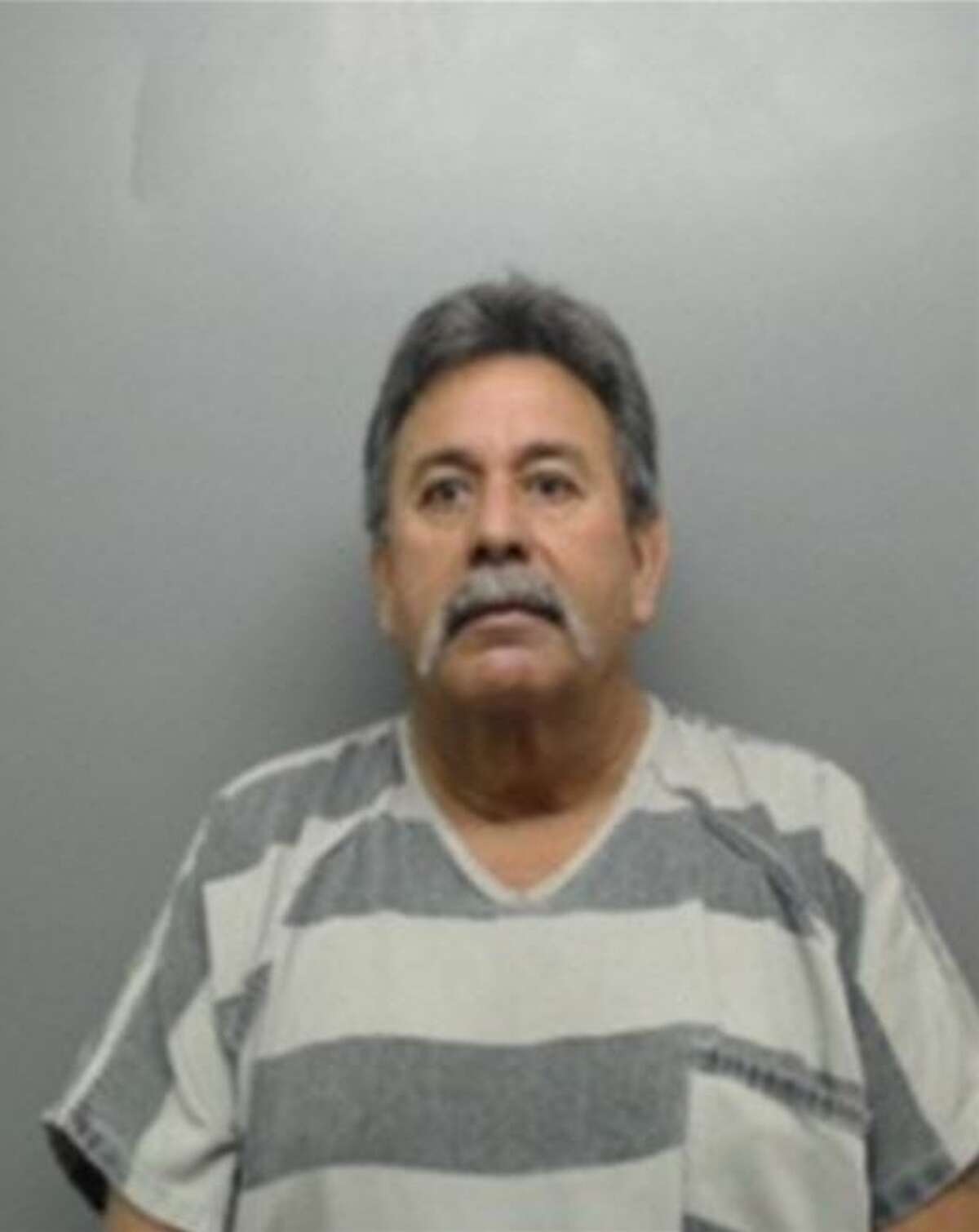 Arnoldo Rene Villarreal, 61, was served with warrants charging him with two counts of indecency with a child by sexual contact. 