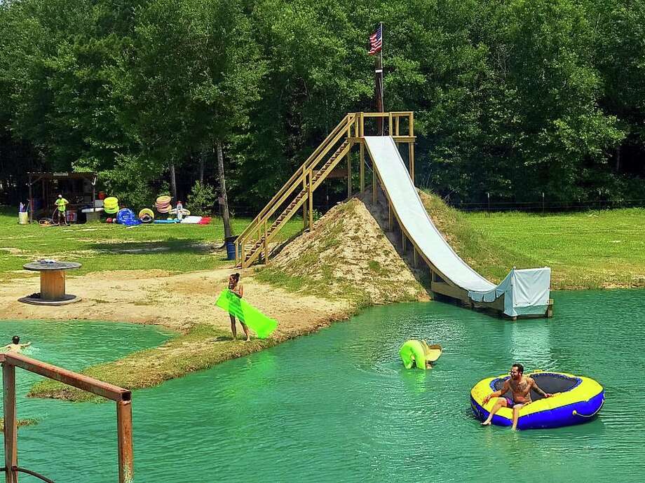 Conroe 'backyard' waterpark turns a swimming hole into a country resort Houston Chronicle