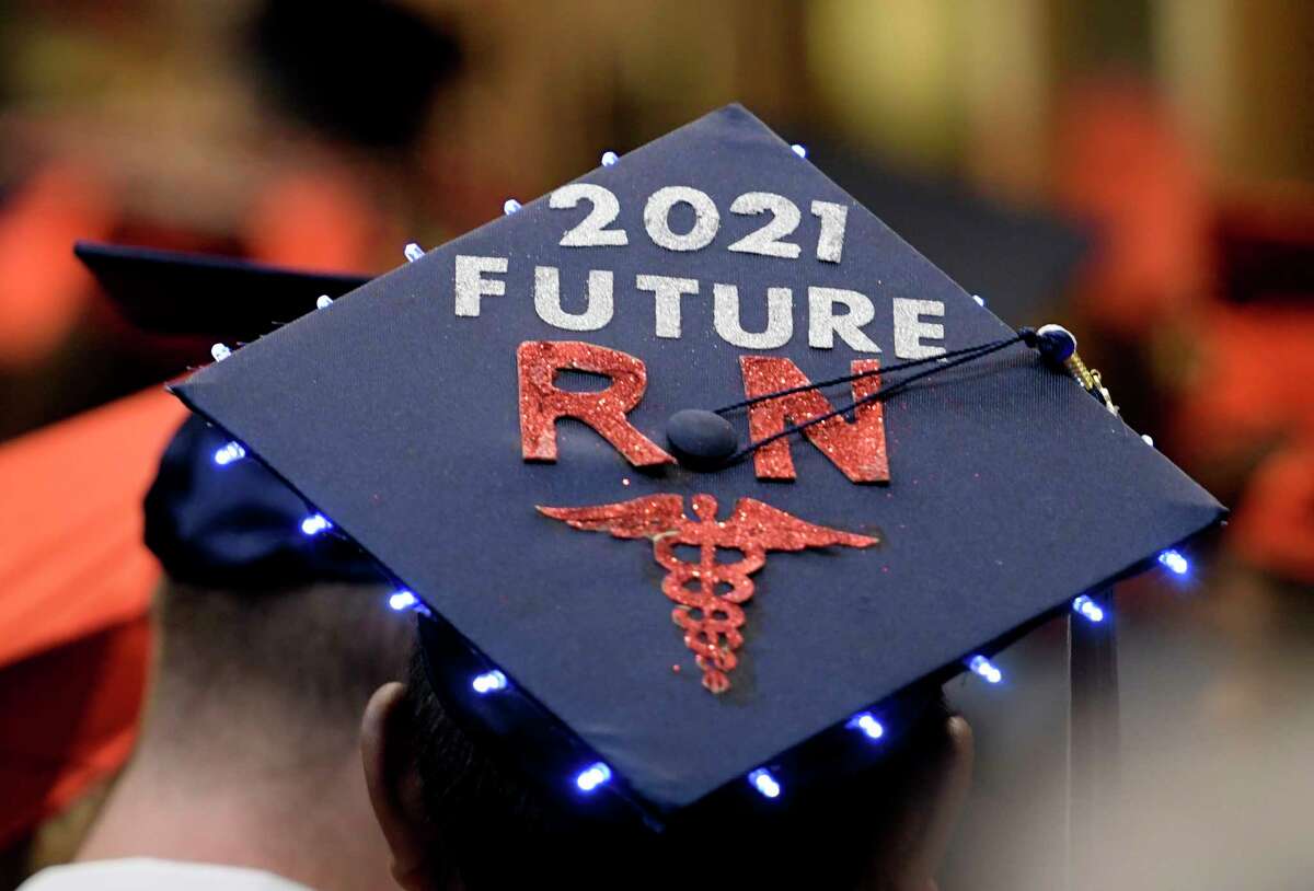 Creativity was evident as graduates decorated their caps and showed them off a the Schenectady High School graduation Friday June 23, 2017 held at Proctor's Theatre in Schenectady, N.Y. (Skip Dickstein/Times Union)