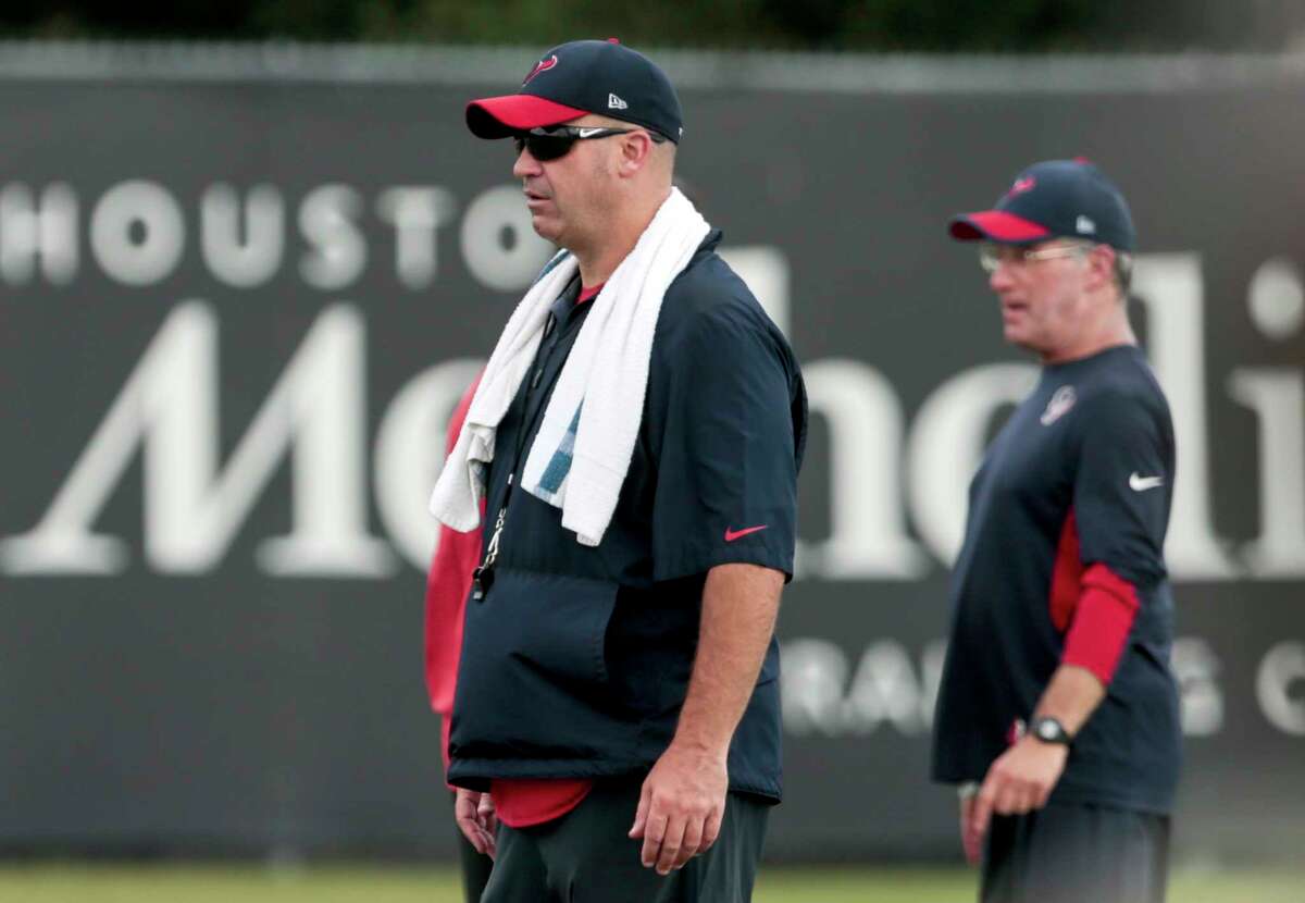 Houston Texans head coach Bill O'Brien watches his team stretch during mini camp at The Methodist Training Center on Tuesday, June 13, 2017, in Houston. ( Brett Coomer / Houston Chronicle )