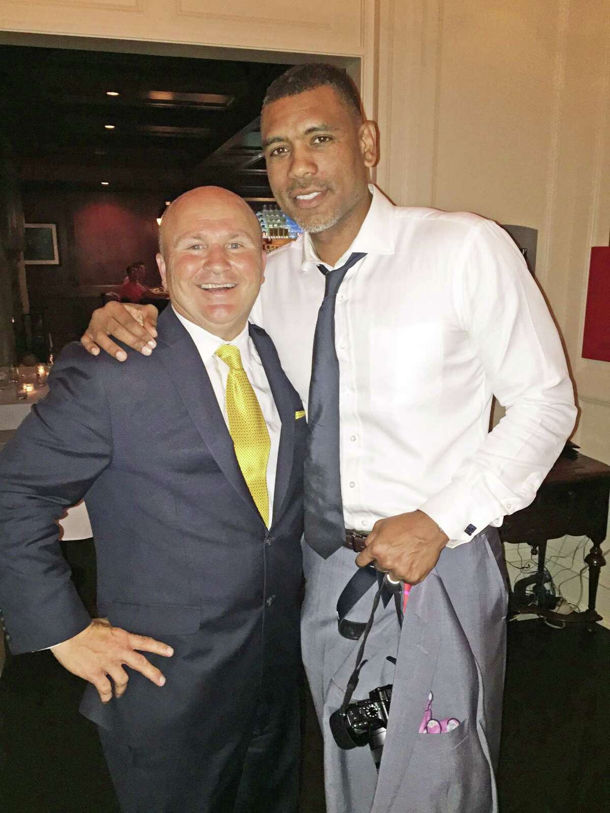 Tony Capasso, General Managing Partner of Gabriele's Italian Steakhouse in Greenwich with former NBA star Allan Houston.