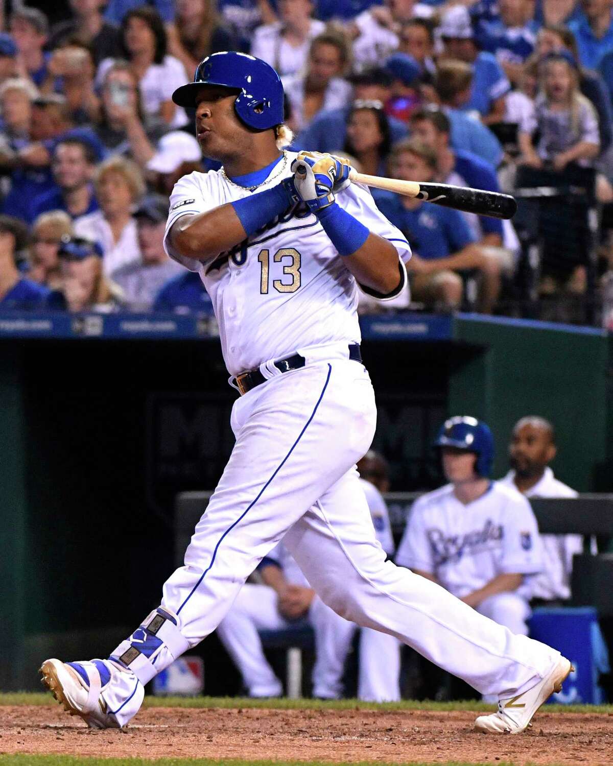 KANSAS CITY, MO -JUNE 23: Salvador Perez #13 of the Kansas City Royals hits a RBI single in the seventh inning against the Toronto Blue Jays at Kauffman Stadium on June 23, 2017 in Kansas City, Missouri. (Photo by Ed Zurga/Getty Images) ORG XMIT: 700011354