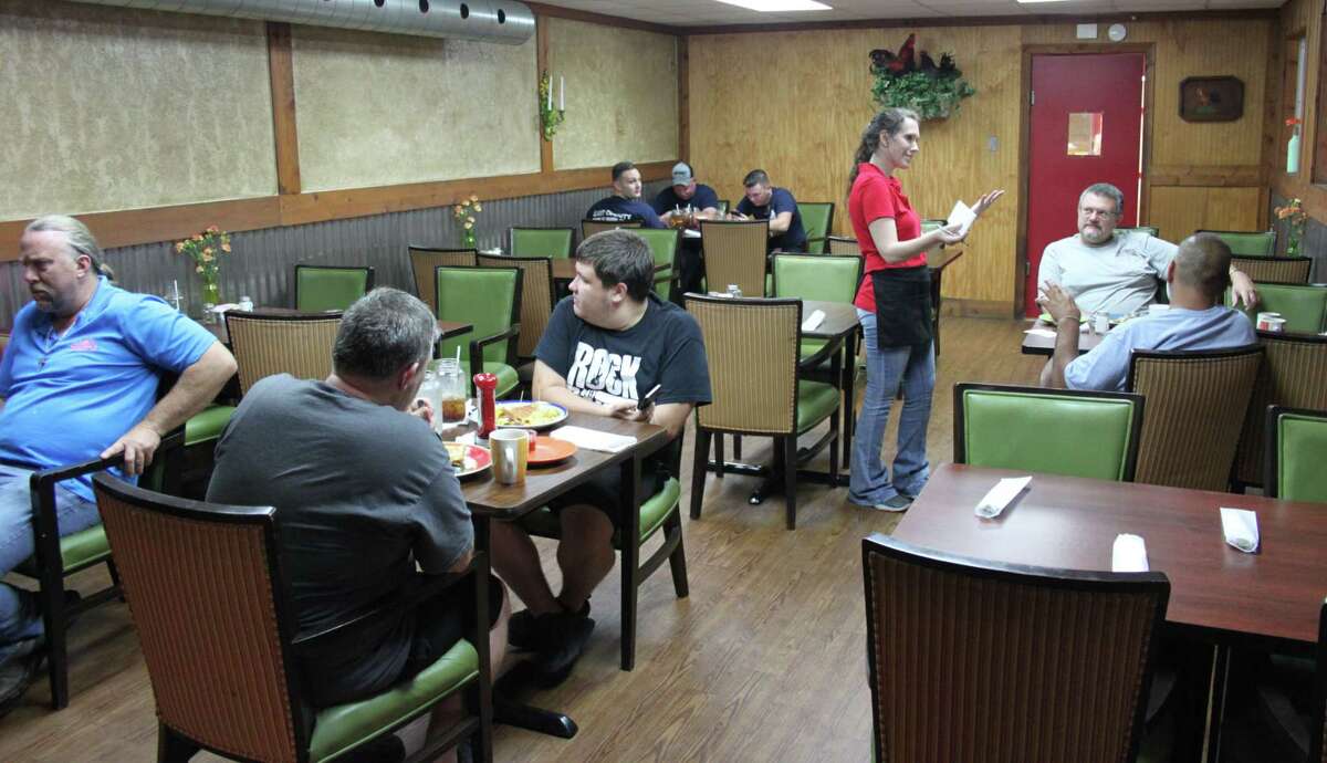 Patrons of the Country Scrambled Cafe sit down on the morning of June 22 to enjoy a nice breakfast.