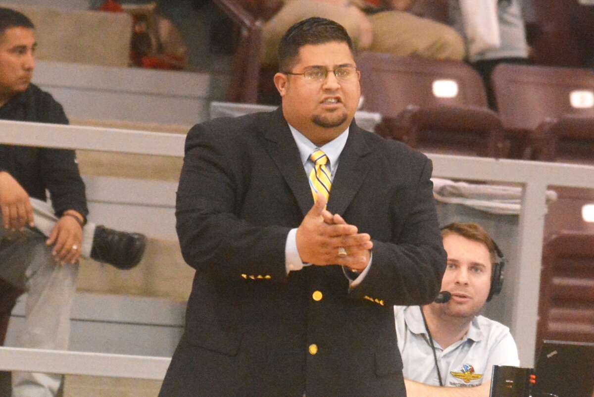Coach Adam Zepeda encourages his team from the sideline during a basketball game. Zepeda will take over as the Floydada boys' basketball coach this year. He spent the last two years at Lockney, where he led the Longhorns to two playoff appearances, one district championship and wins in bi-district and area round games.