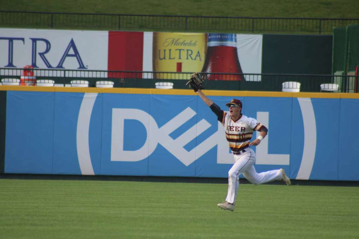 Center fielder Chase Keng begins to celebrate after catching the final out in the state semifinal game against Southlake Carroll. Keng was one of three unanimous First Team All-District picks by the 22-6A coaches.