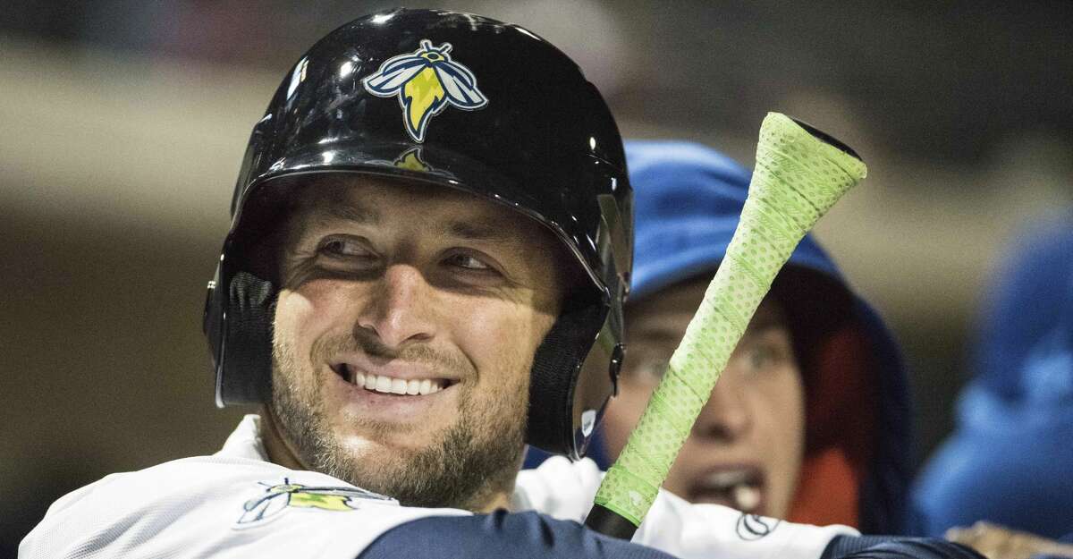 FILE - In April 6, 2017, file photo, Columbia Fireflies outfielder Tim Tebow smiles during a Class A minor league baseball game against the Augusta GreenJackets in Columbia, S.C. Tebow continues to grind in the minor league as he pursues his quest to play pro baseball at the highest level. After two months with the New York Mets Class A affiliate in Columbia, South Carolina, the former Heisman Trophy winnerâs performance has been inconsistent and there remains no timetable for how long he will remain with the Fireflies.(AP Photo/Sean Rayford, File)