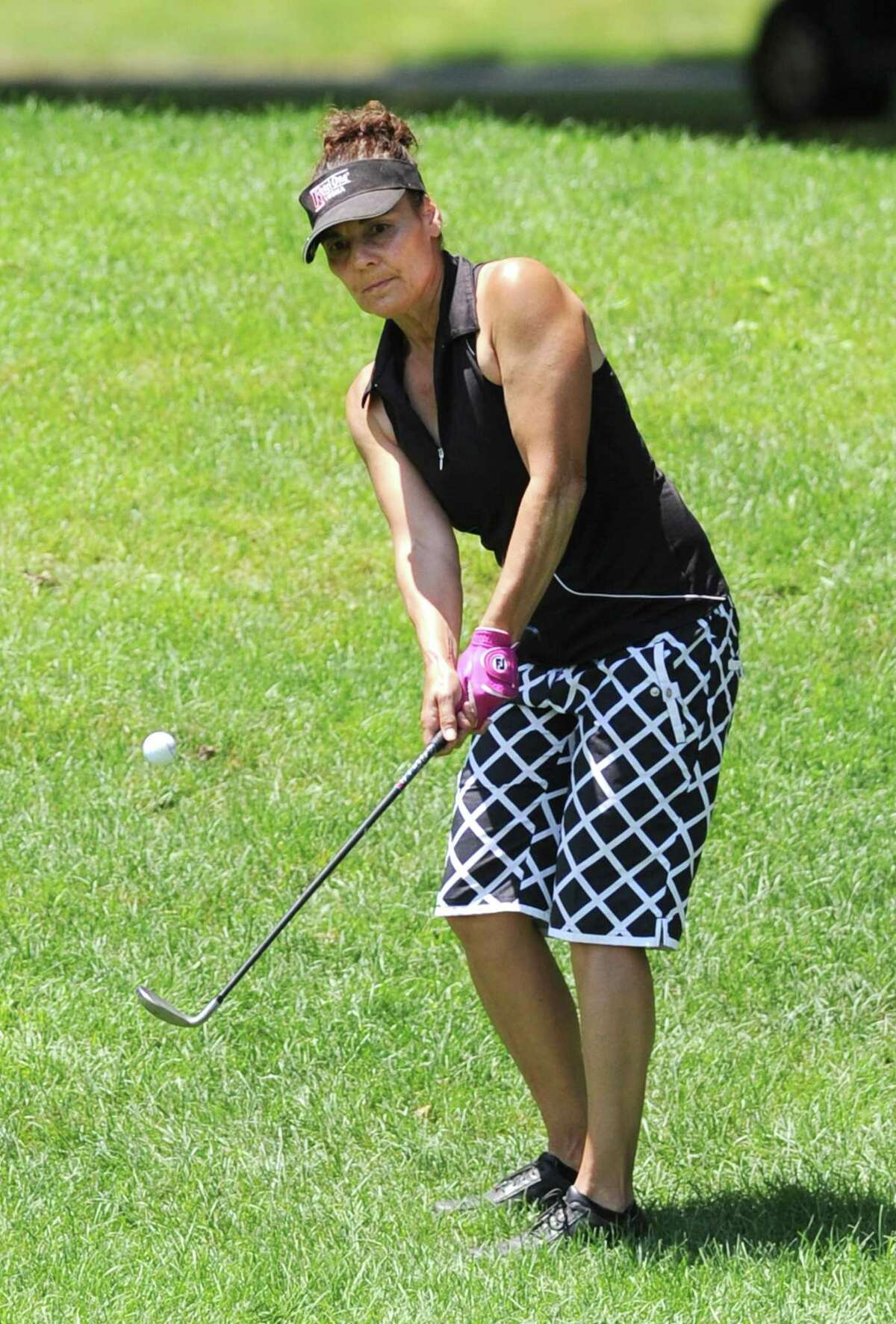 Carol Frattaroli hits a chip shot on day two of the 2017 Stamford Amateur Golf Championship at Sterling Farms Golf Course in Stamford, Conn. Sunday, June 25, 2017. Jason Jaworoski won the Mens Championship, Carol Frattaroli won the Womens Championship, and Rob Tyska won the Mens Senior Championship.