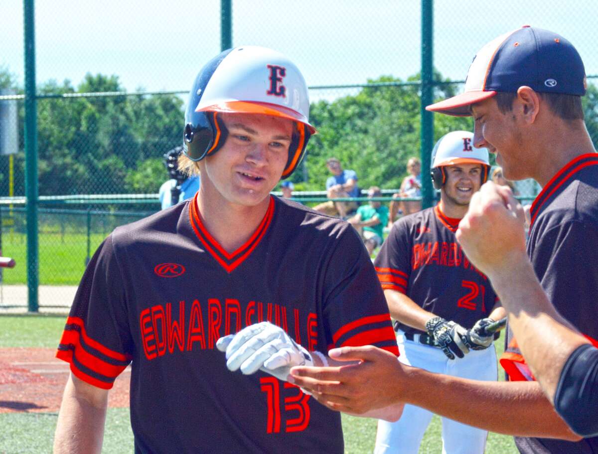 Jonathon Yancik, left, is congratulated by teammates after hitting a solo home run in the second inning of Saturday’s game against the St. Louis Prospects.