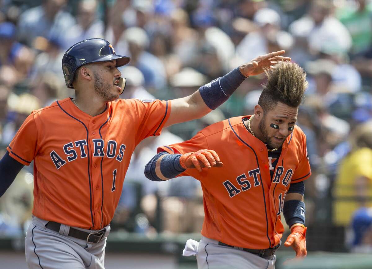 SEATTLE, WA - JUNE 25: Yuli Gurriel #10 of the Houston Astros and Carlos Correa #1 of the Houston Astros celebrate a two-run home run by Gurriel off of starting pitcher Ariel Miranda #37 of the Seattle Mariners that also scored Correa during the fourth inning of a game at Safeco Field on June 25, 2017 in Seattle, Washington. (Photo by Stephen Brashear/Getty Images)