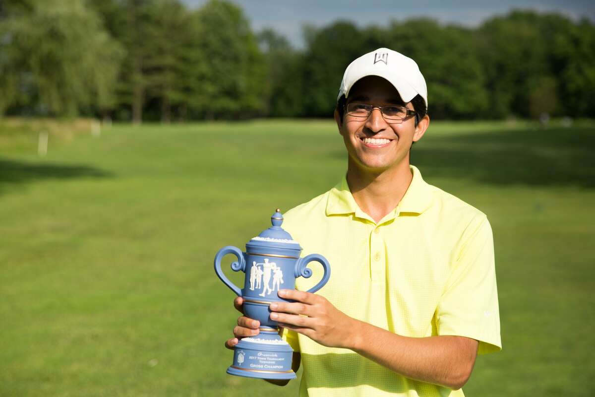 Gross Champion Jason Morilla stands with his trophy after the Town Tournament at the Griffith E. Harris Golf Club in Greenwich, Conn. on Sunday, June 25, 2017.