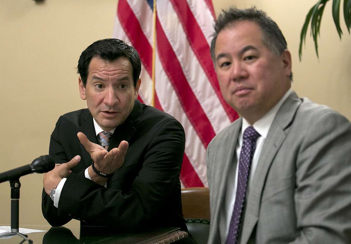 Assembly Speaker Anthony Rendon, D-Paramount, left, accompanied by Assembly budget chair Phil Ting, D-San Francisco, responds to a question concerning the state budget agreement reached between Gov. Jerry Brown and Democratic lawmakers, Tuesday, June 13, 2017, in Sacramento, Calif. (AP Photo/Rich Pedroncelli)
