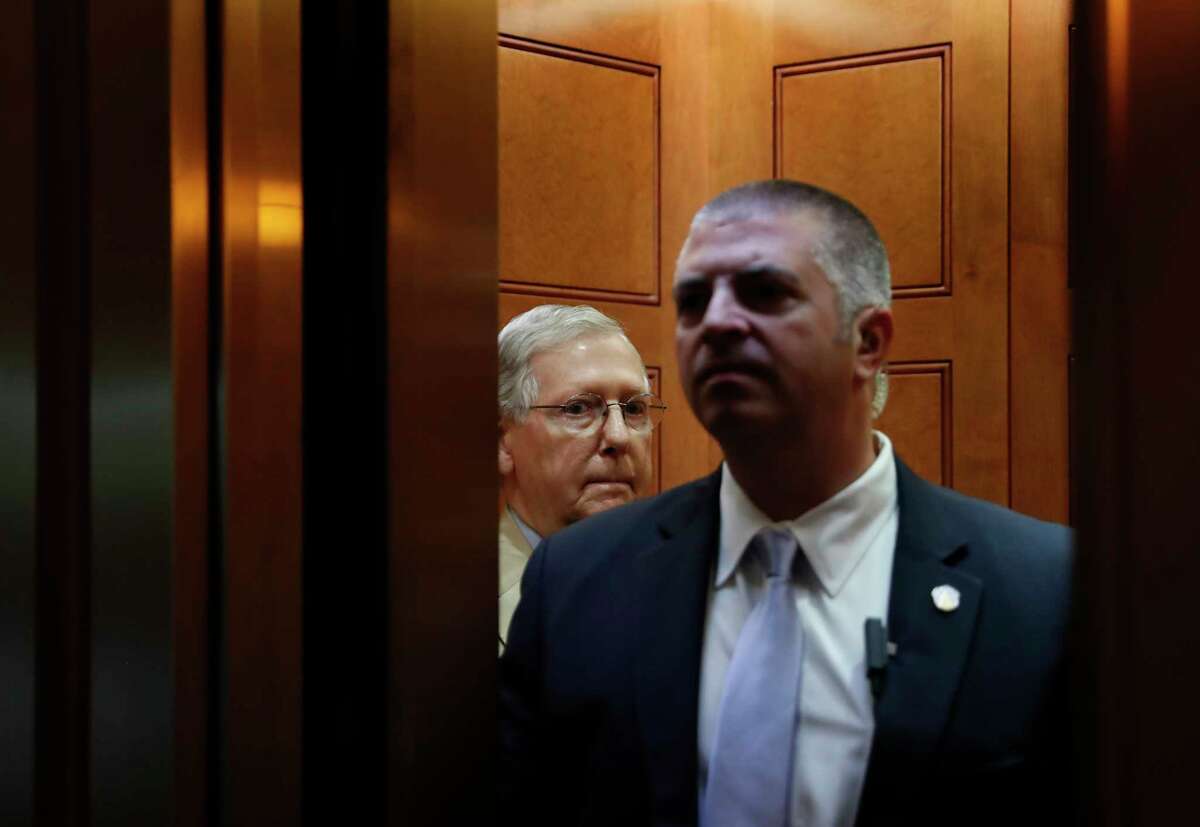 Senate Majority Leader Mitch McConnell of Ky., looks out after boarding an elevator Capitol Hill in Washington, Monday, June 26, 2017. Senate Republicans unveil a revised health care bill in hopes of securing support from wavering GOP lawmakers, including one who calls the drive to whip his party's bill through the Senate this week "a little offensive." (AP Photo/Carolyn Kaster)