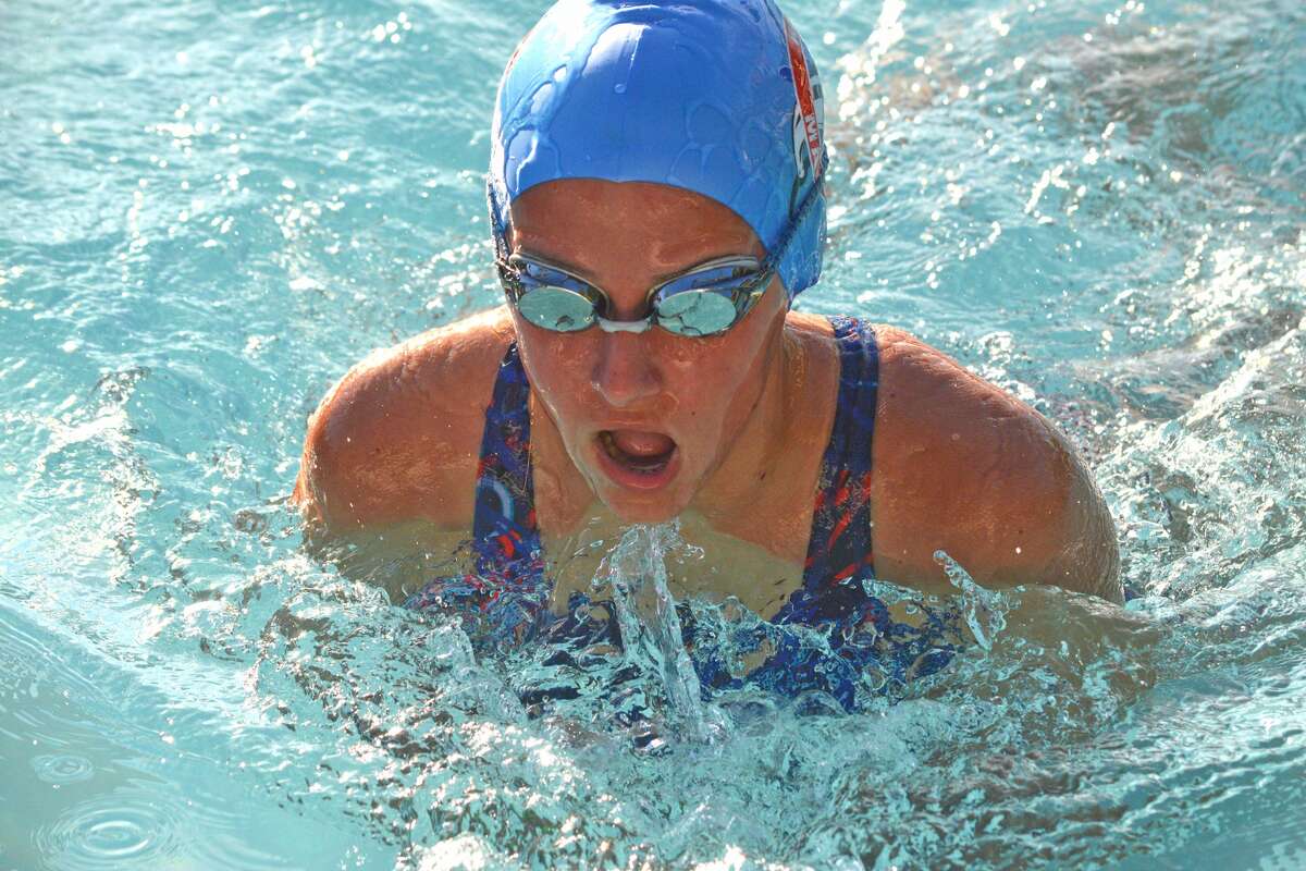 Chloe Harrison of Water Works competes in the girls' 11-12 150-yard breaststroke relay during Monday's SWISA Relay Meet at Sunset Hills.