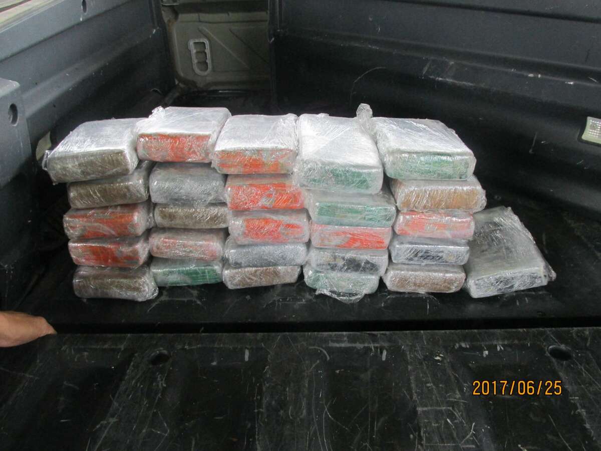 The bundles contained over 65 pounds of cocaine with an estimated value of $2.1 million.