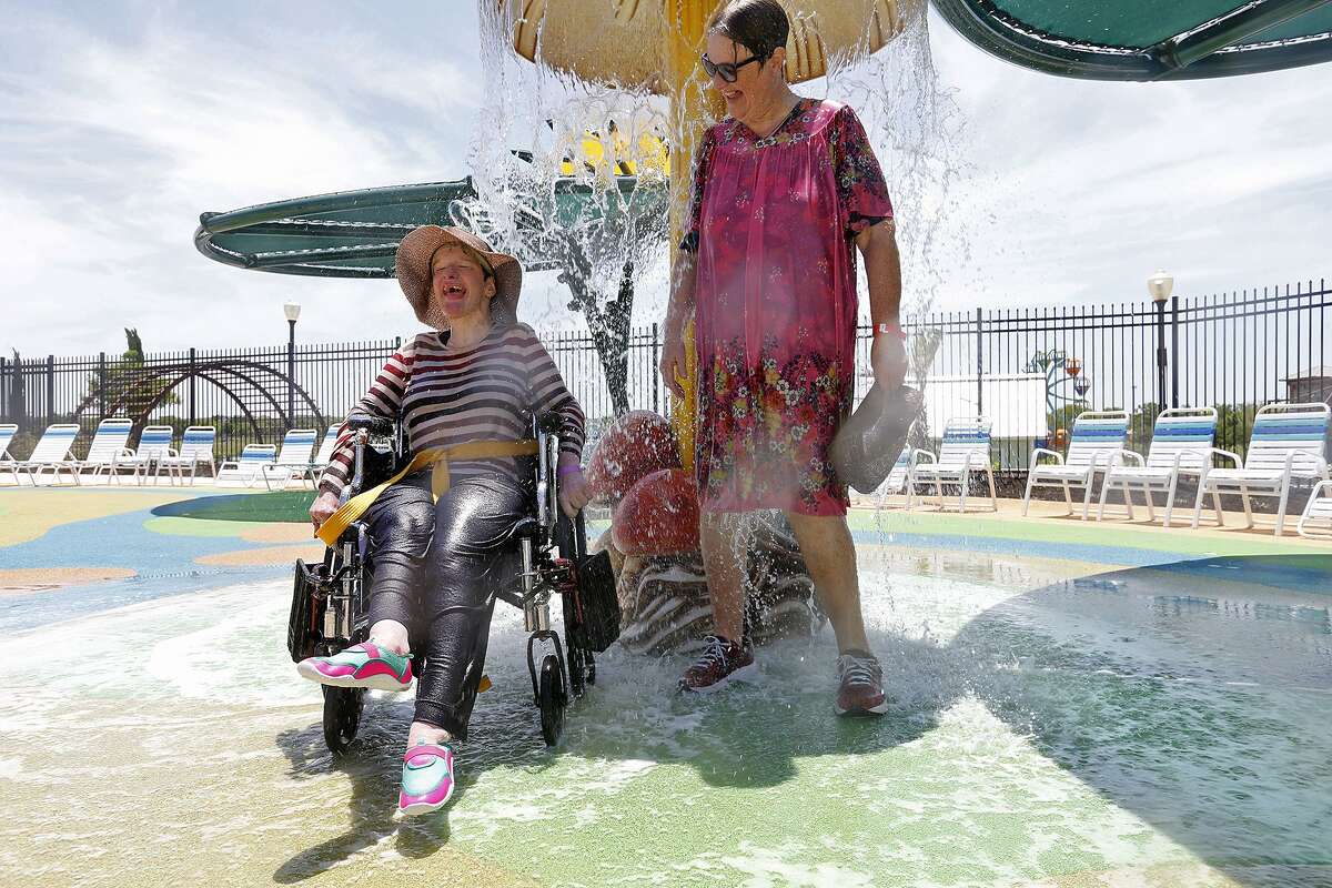 Cindy Dolder and her mother, Judy Rhoads, enjoy the Calypso Cove portion of Morgan’s Inspiration Island at Morgan’s Wonderland. A reader commends the park for the service it provides for individuals with special needs.