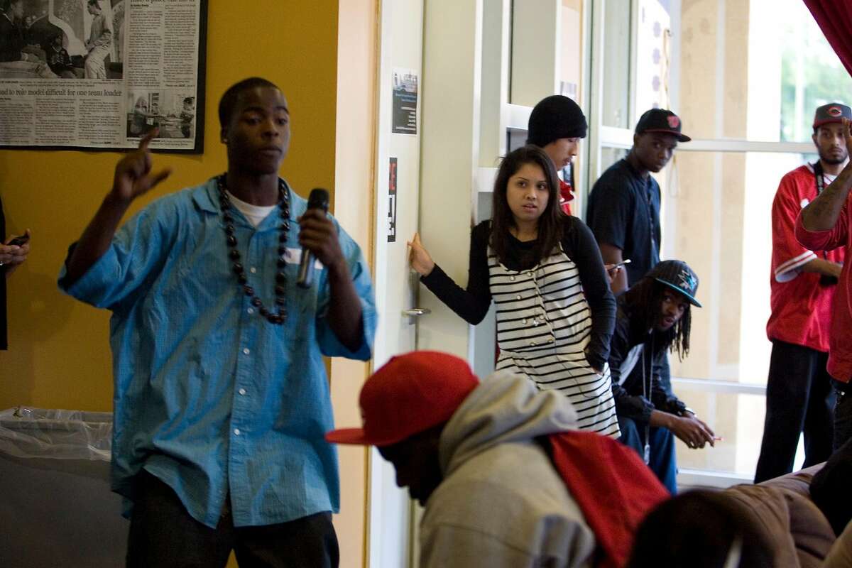 Javae Reed, 19, takes a turn at the mic at Youth UpRising in Oakland, Calif. on Thursday, July 8, 2010 Youth UpRising along with the Oakland Parks and Rec department organized several locations for community members and especially youth to have a location to talk and share their feeling shortly after former BART officer Johannes Mehserle was convicted of involuntary manslaughter for the shooting death of Oscar Grant. Kat Wade / Special to the Chronicle