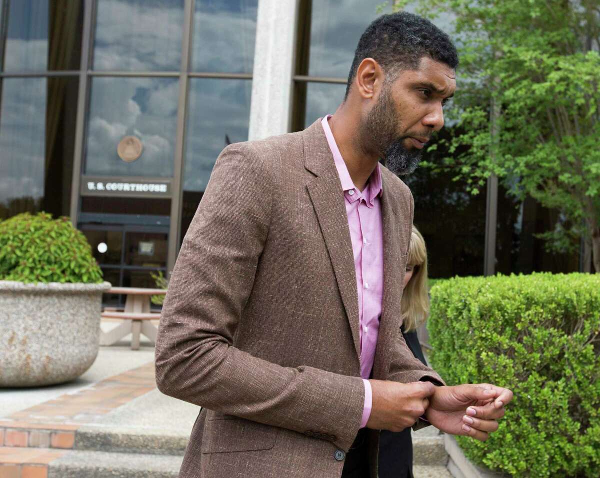 Tim Duncan leaves the federal courthouse in San Antonio Tuesday, June 27, 2017 after giving a victim impact statement during the sentencing phase of the NBA legend's former financial adviser Charles Banks, who admitted he bamboozled Duncan into guaranteeing a $6 million loan used as part of an investment in a sports-merchandise company linked to Banks.