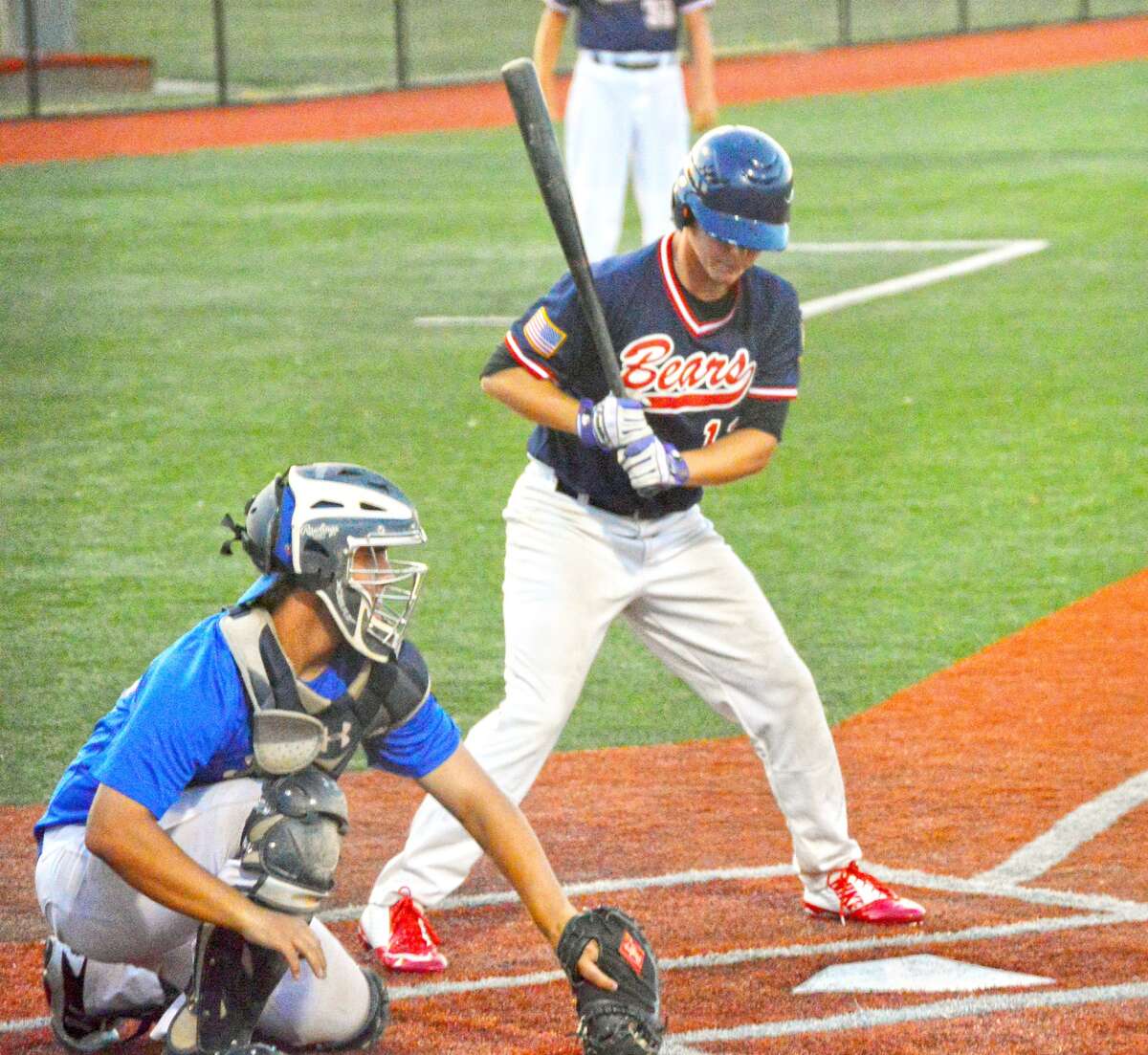 Metro-East second baseman Joel Quirin looks at a pitch low during his first-inning at-bat against Belleville on Tuesday at SIUE.