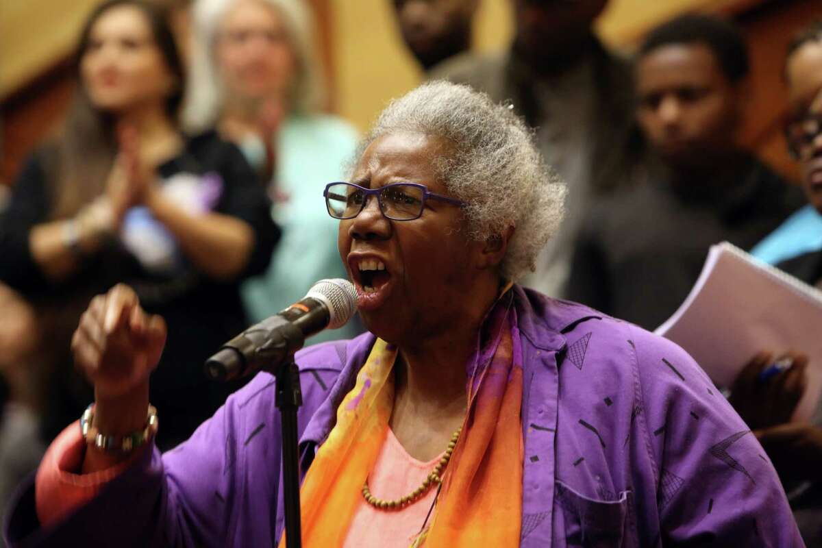 Rev. Harriett Walden, co-founder of Mothers for Police Accountability, speaks as hundreds attend a city hall hearing with the Seattle City Council over the killing of Charleena Lyles by Seattle police officers, Tuesday, June 27, 2017 at UW's Kane Hall.