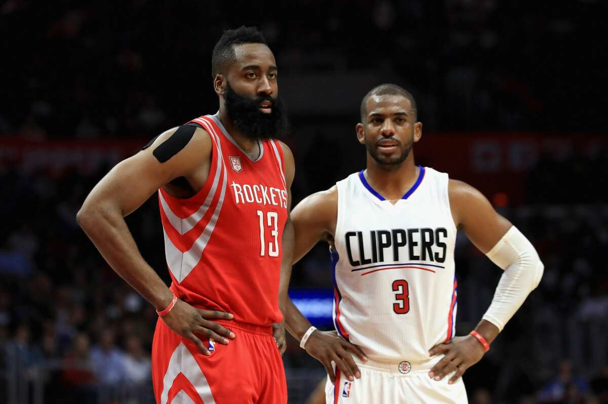 LOS ANGELES, CA - APRIL 10: James Harden #13 of the Houston Rockets and Chris Paul #3 of the LA Clippers look on during the second half of a game at Staples Center on April 10, 2017 in Los Angeles, California. NOTE TO USER: User expressly acknowledges and agrees that, by downloading and or using this Photograph, user is consenting to the terms and conditions of the Getty Images License Agreement (Photo by Sean M. Haffey/Getty Images)