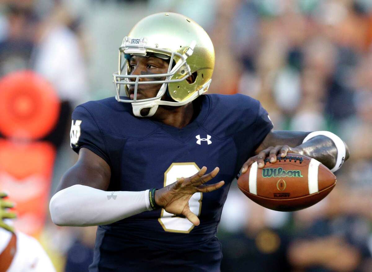 FILE- This Sept. 5, 2015 file photo shows Notre Dame quarterback Malik Zaire looking to a pass during the first half of an NCAA college football game against Texas in South Bend, Ind. Florida might have solved its long-running quarterback problem with the addition of Notre Dame transfer Malik Zaire. That move became official last week and as a graduate transfer Zaire will be immediately eligible. (AP Photo/Nam Y. Huh, file)