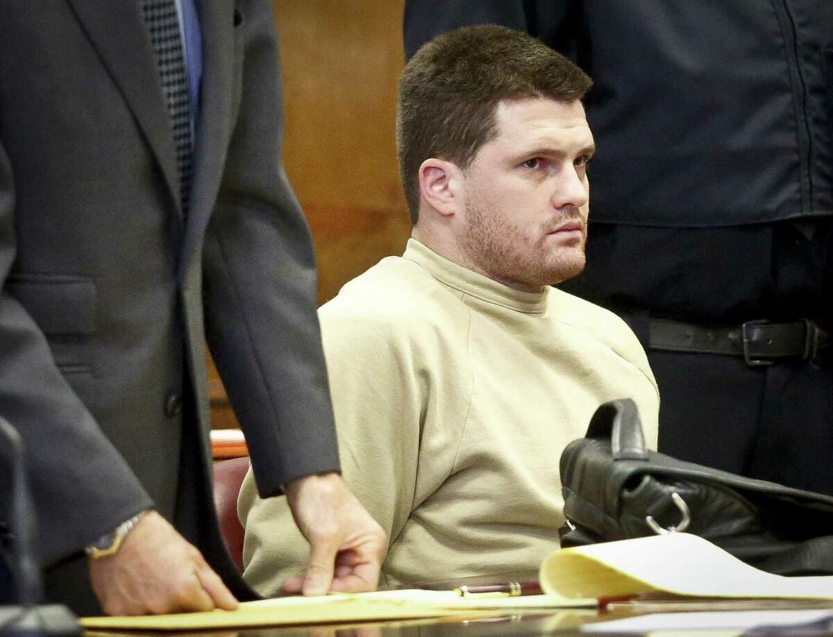 Rackover listens as his lawyer speaks during his arraignment in criminal court, Tuesday Dec. 13, 2016, in New York. Rackover was originally charged with concealment of a human body, hindering prosecution and tampering with evidence in the stabbing death of 26-year-old Joseph Comunale from Connecticut. (AP Photo/Bebeto Matthews)