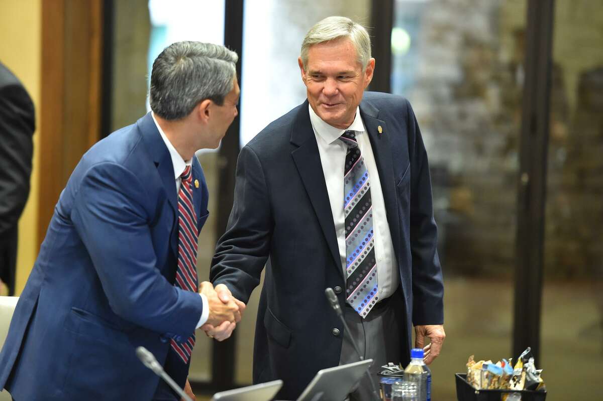 District 10 Councilman Clayton Perry shakes hands with Mayor Ron Nirenberg before the City Council Fiscal year 2018 Budget Goal-Setting Session Wednesday in the Lonesome Dove Room of the Henry B. Gonzalez Convention Center.