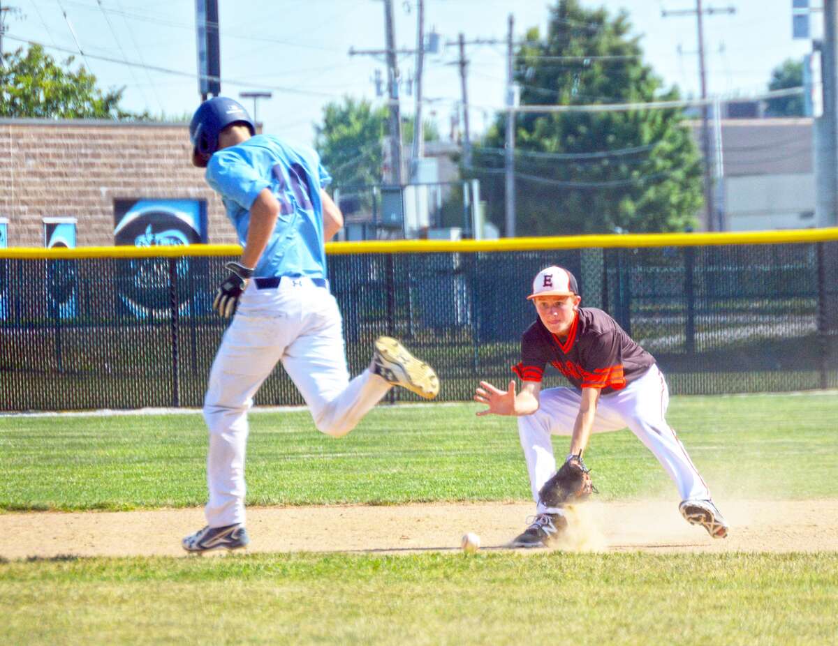 Edwardsville second baseman Zac Crutchfield, right, fields a ground ball in the second inning of Wednesday’s game at Belleville East.