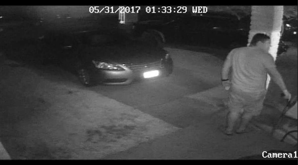 Police are seeking to identify the man who walked up to a home carrying a handgun and threatening to kill a family.  