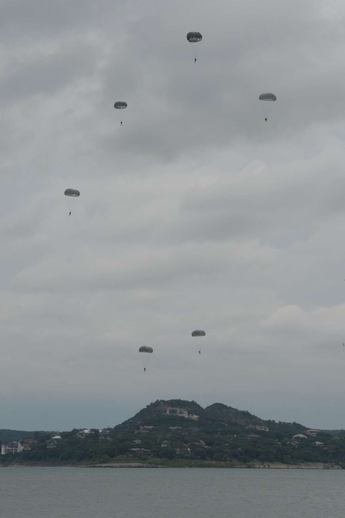Photos: Texas Guardsmen parachute 1,500 feet into Canyon Lake for training  operation