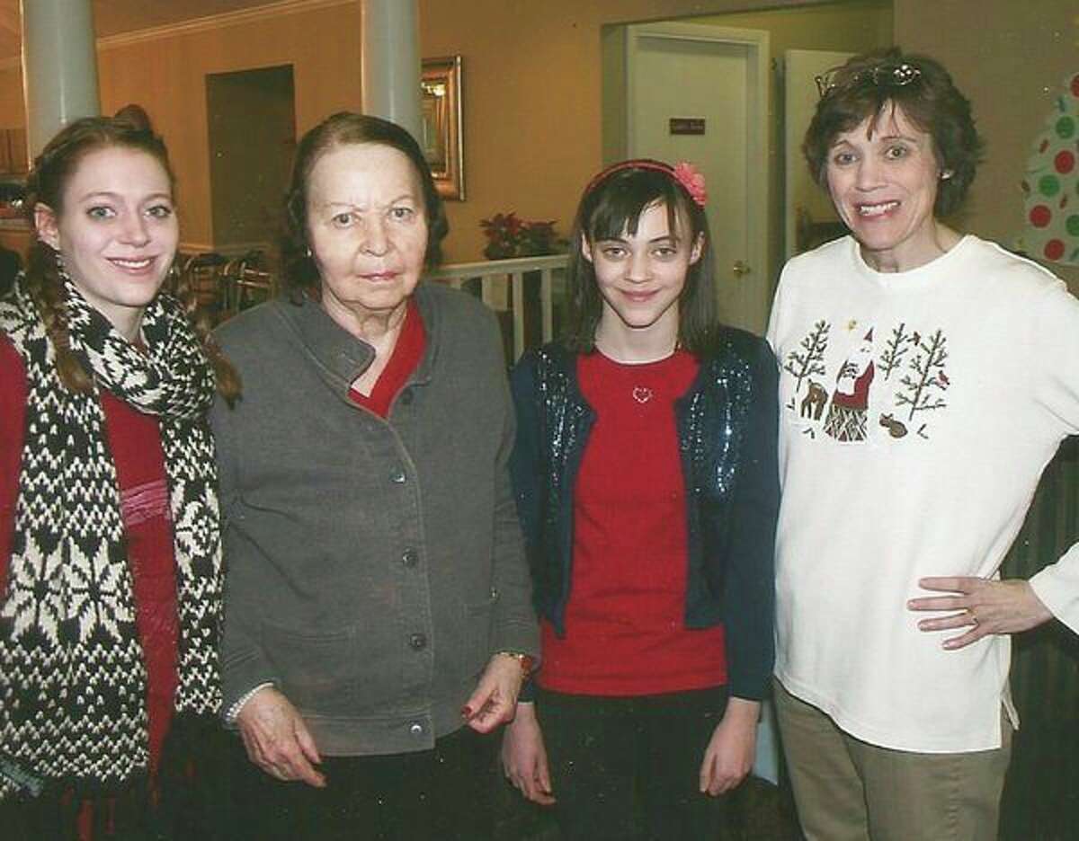   Cindy Lowery and her daughters visit with Joan Haskins over the holidays. (Photo provided)