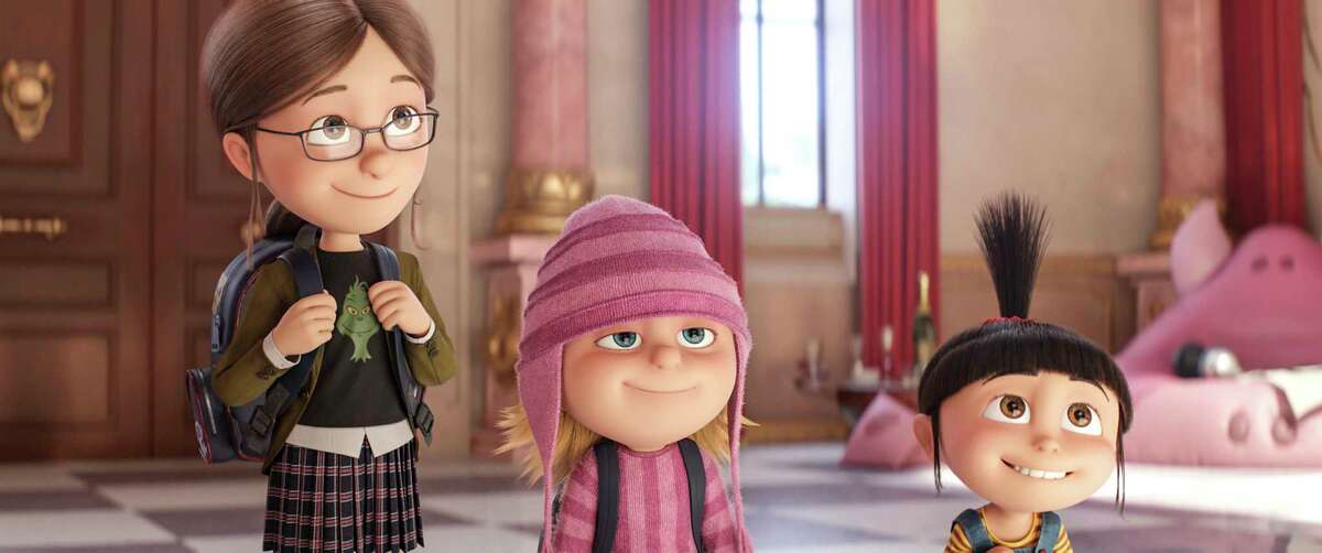This image released by Illumination and Universal Pictures shows characters Margo, voiced by Miranda Cosgrove, from left, Edith, voiced by Dana Gaier and Agnes, voiced by Nev Scharrel, in a scene from "Despicable Me 3." (Illumination and Universal Pictures via AP)