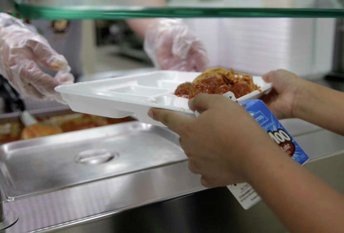 Fourth graders at Hancock Elementary School have their lunch served on Thursday, April 6, 2017, in Houston. The school offers a program where parents can put extra money in the funds so students who forget their lunch money get a full meal. ( Elizabeth Conley / Houston Chronicle )