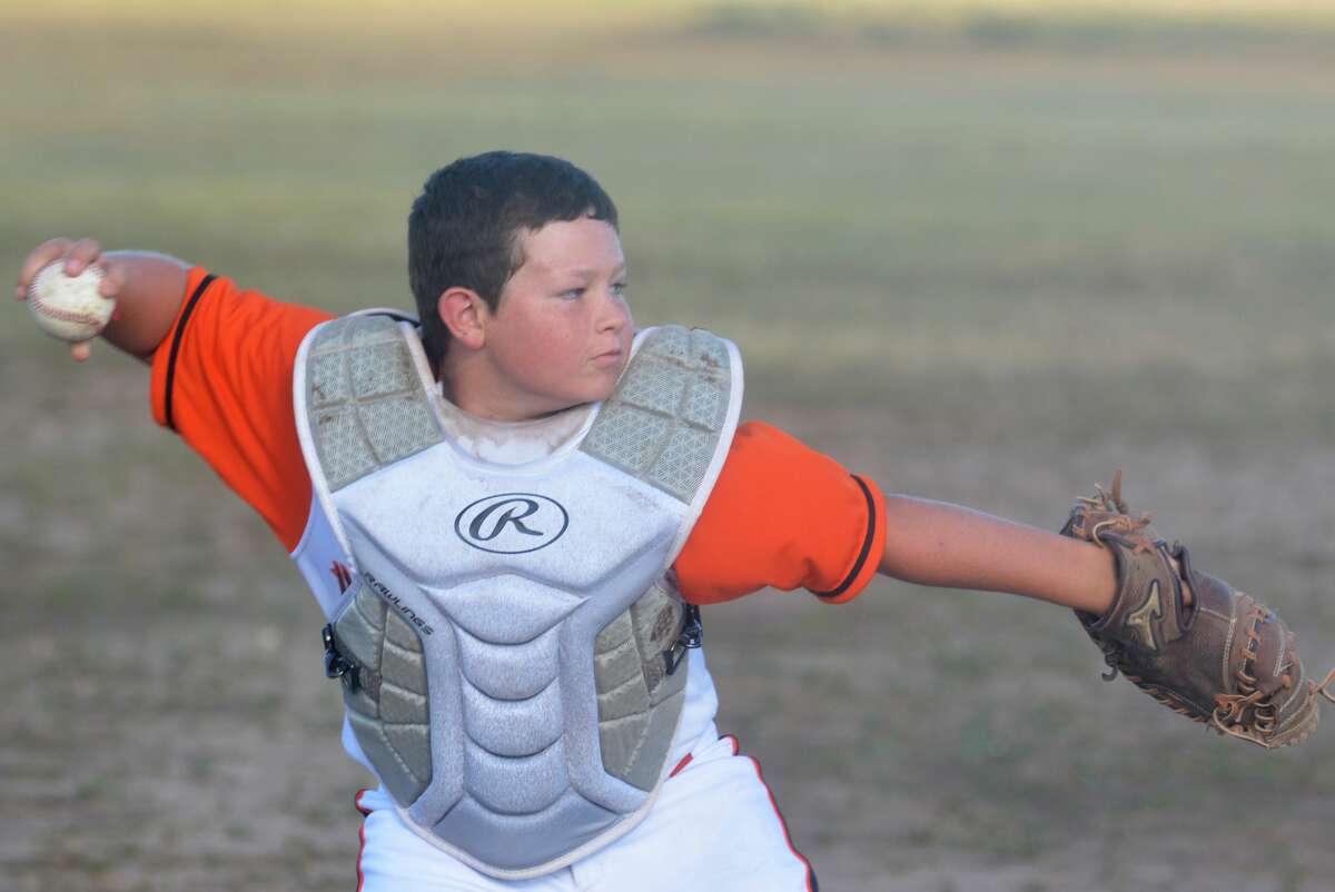 Plainview Mafia catcher Kole Campbell fires to first base during practice at the team's field this week.