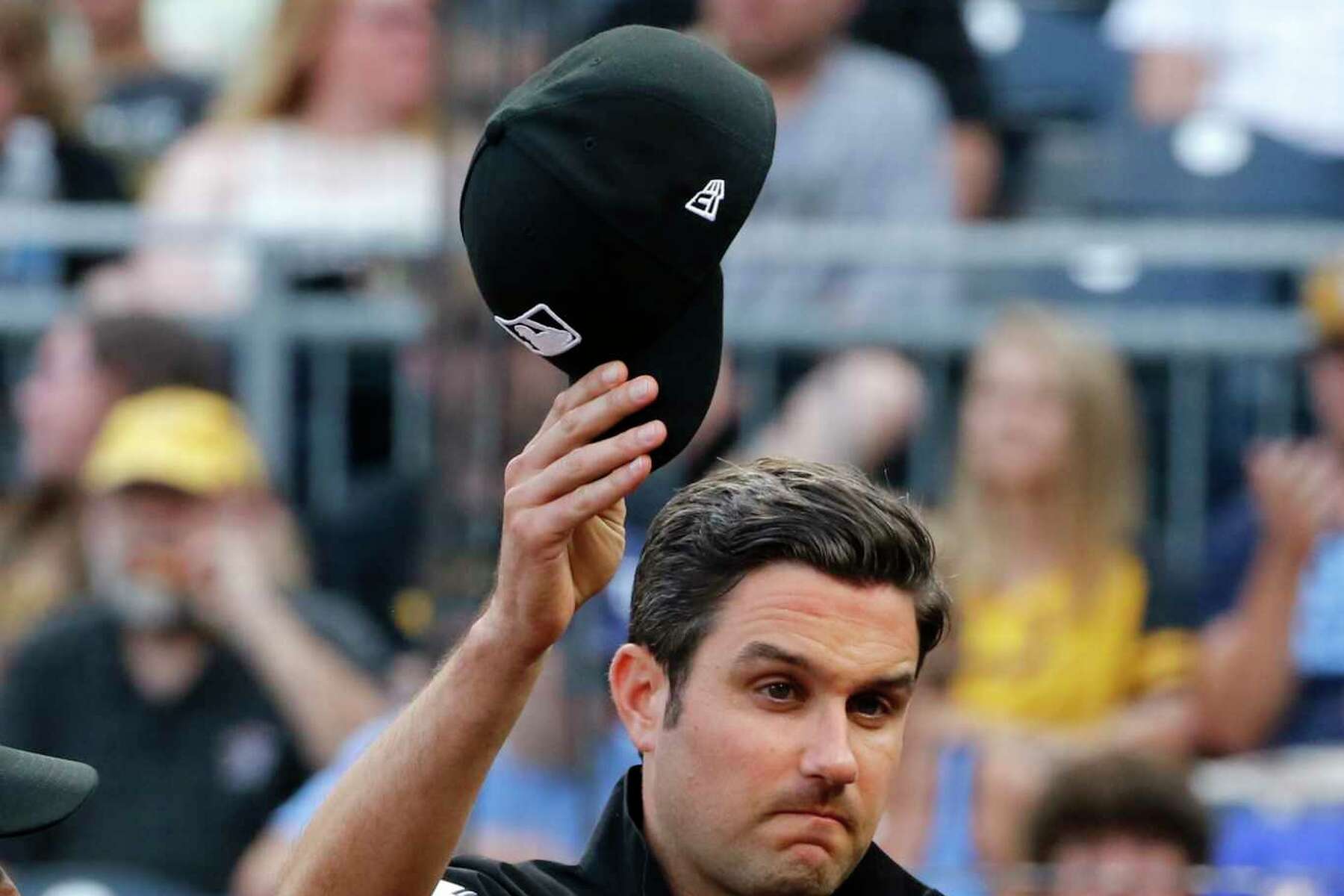 MLB umpire pulls woman from edge of Roberto Clemente Bridge in