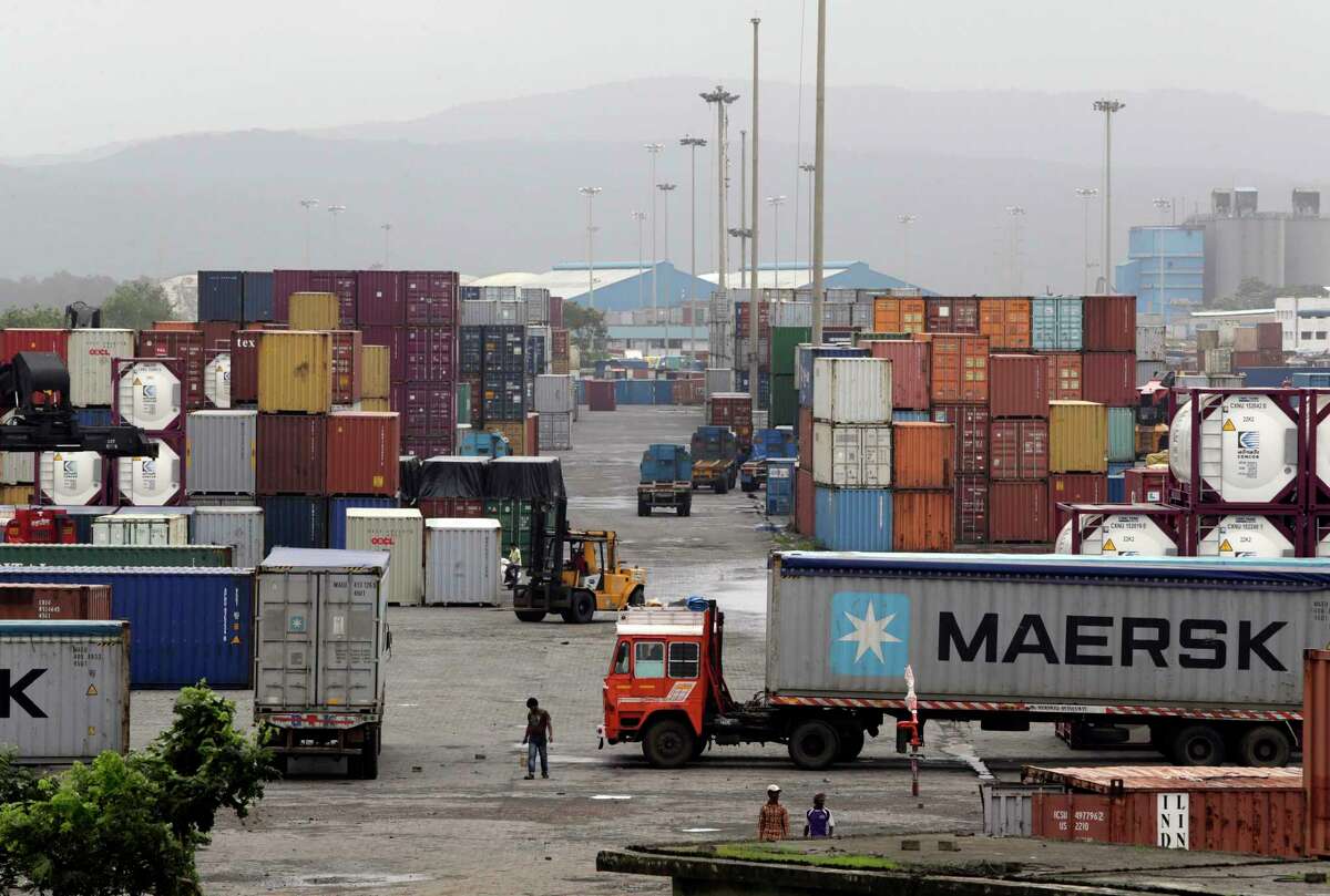 Containers are piled up at a terminal at the Jawaharlal Nehru Port Trust in Mumbai, India, Thursday, June 29, 2017. Operations at a terminal at India's busiest container port have been stalled by the malicious software that suddenly burst across the worldÂ?’s computer screens Tuesday, another example of the disruption that continues to be felt globally. (AP Photo/Rajanish Kakade)