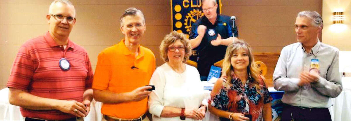 Paul Harris Fellows were awarded at the Plainview Rotary Club on Tuesday. Recipients include Bob Copeland (left), Paul Holloway, Cynthia Gregory and Kim Street. Ted Baker and Leslie Gattis presented the awards.