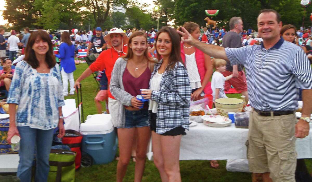Hundreds of families turned out to Waveny Park on the evening of July 4th for the New Canaan Family Fourth celebration. Despite a mixed forecast, the weather held and the half hour fireworks show went forward.