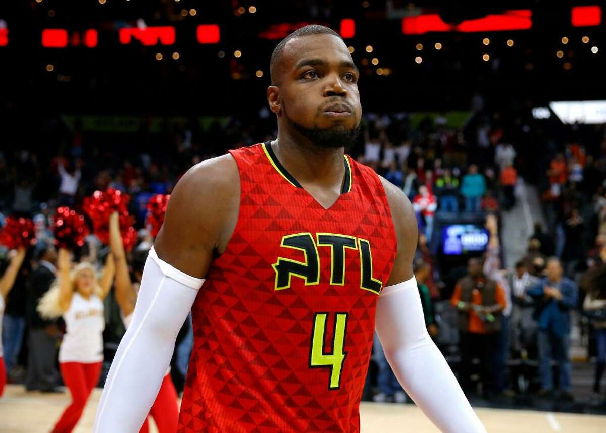 Atlanta Hawks forward Paul Millsap, tempting free agent, reacts at the conclusion of a game against the New York Knicks on Sunday, Jan. 29, 2017, in Atlanta. The Hawks won the game in the fourth overtime 142-139.